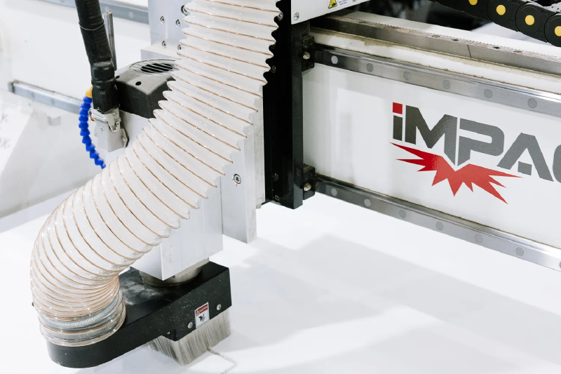 Print Frame Sends CNC Router being used for metal photo prints